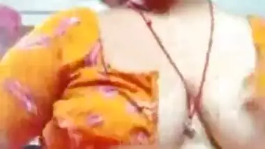 Busty village bhabhi showing boobs while dressing