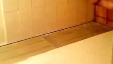 Girl spying on her stepmom having nude bath