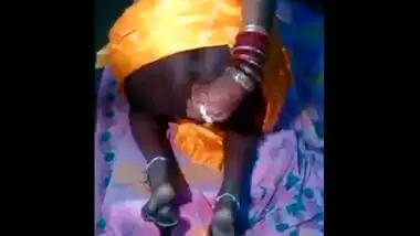 Village ass fucks an orange dildo
