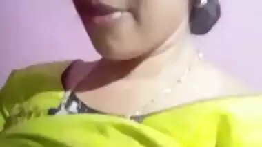 Attractive Indian teen gladly plays with her XXX boobs and nipples