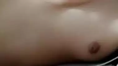 Cute skinny girl showing her small tits on VC