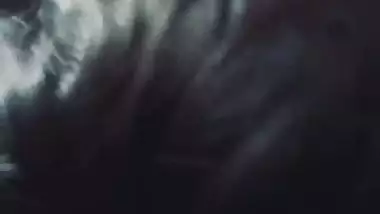 Slim girlfriend smiling while giving handjob and blowjob