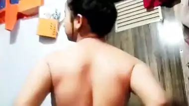 An 18-year-old sexy teen squeezes her big boobs and ass