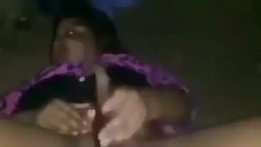 Nude desi lady fucks her hairy pussy with a brinjal