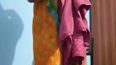Curvaceous Indian girl removing saree and nude show
