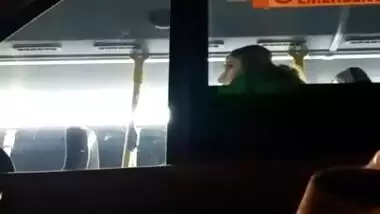 Cute Indian girl on bus pretends not to see my cock