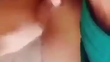 Horny girl squeezes her boobs and fingers her hairy pussy