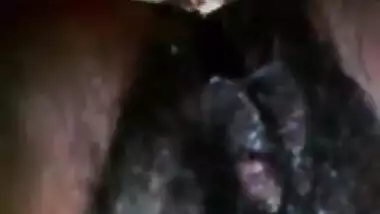Malaysian Lady showing her dark pussy 